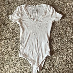 Small white bodysuit from Hollister.